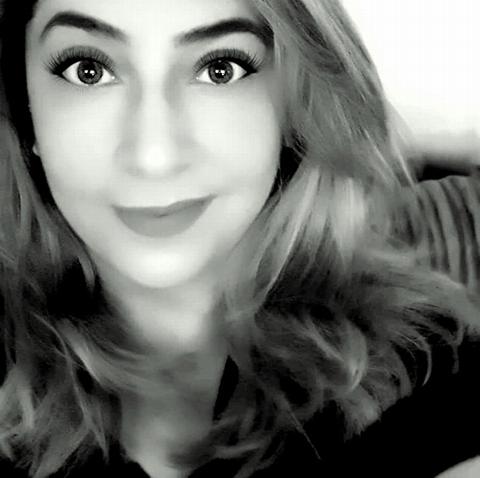 a greyscale image of Samina Aziz, founder and life coach for Sam Aziz Life Coaching